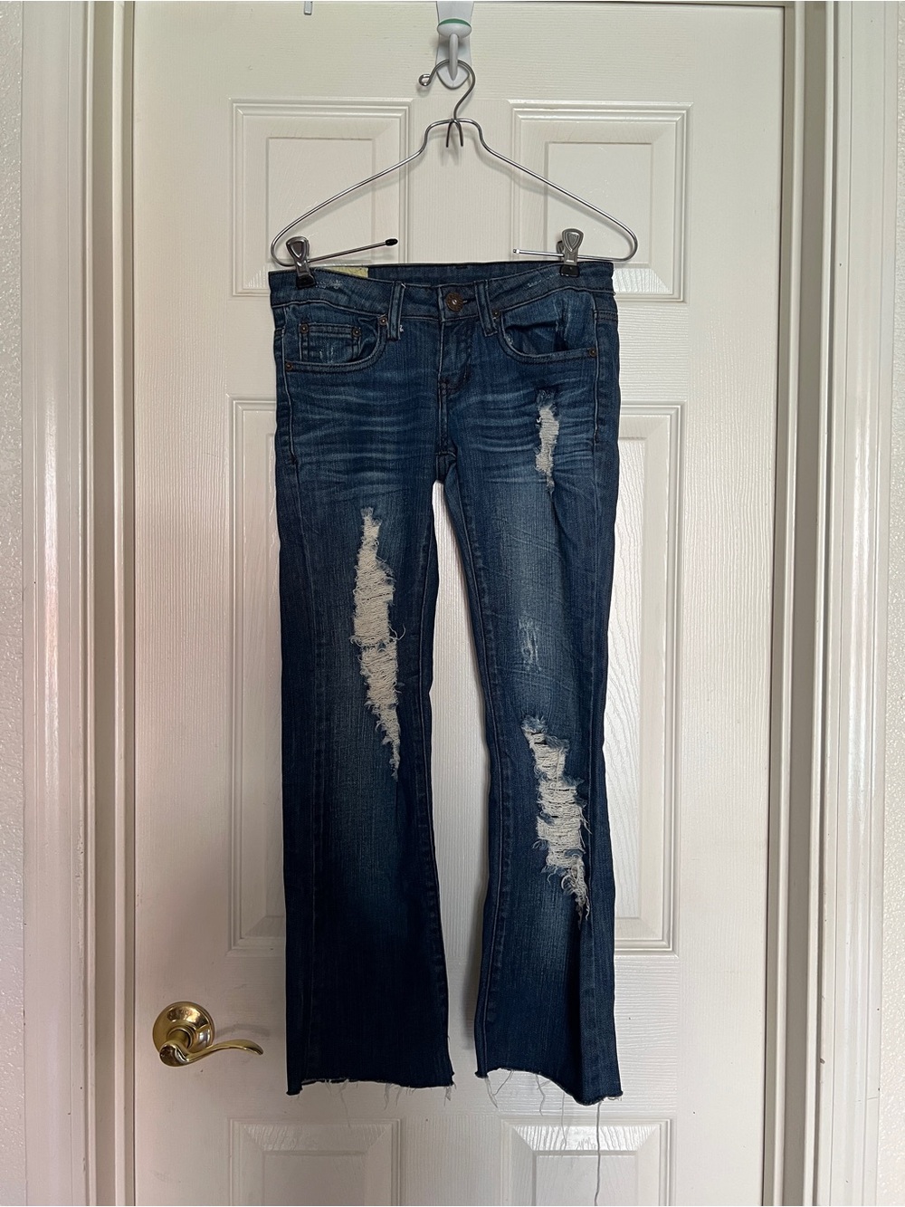 Women’s Distressed Dark Blue Jeans